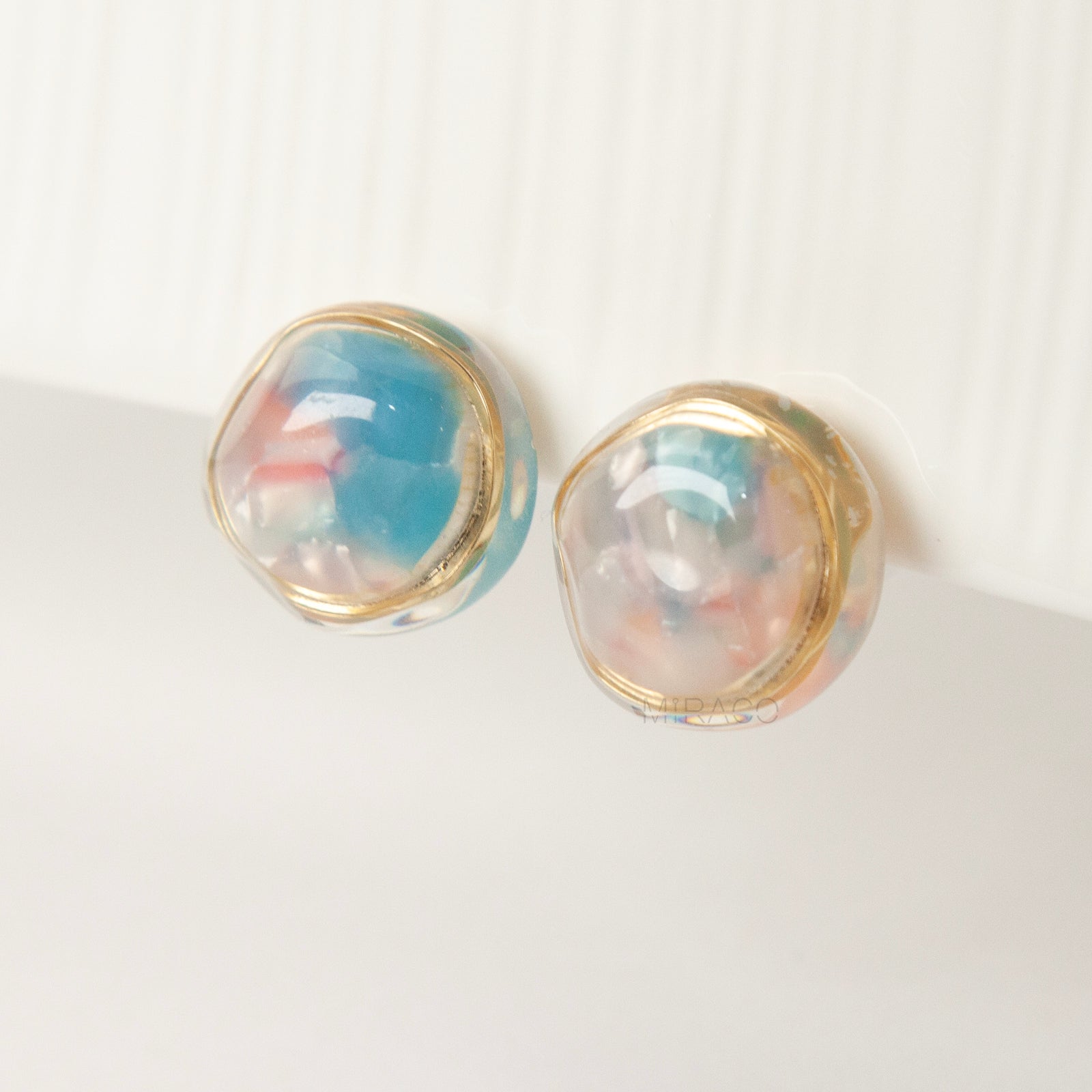 clip on earrings coil back, vintage style clip on earrings, dome resin earrings, blue pink clip on earrings, non pierced earrings gold trim, retro clip on earrings, resin dome jewellery, coil back earrings for women, lightweight clip on earrings