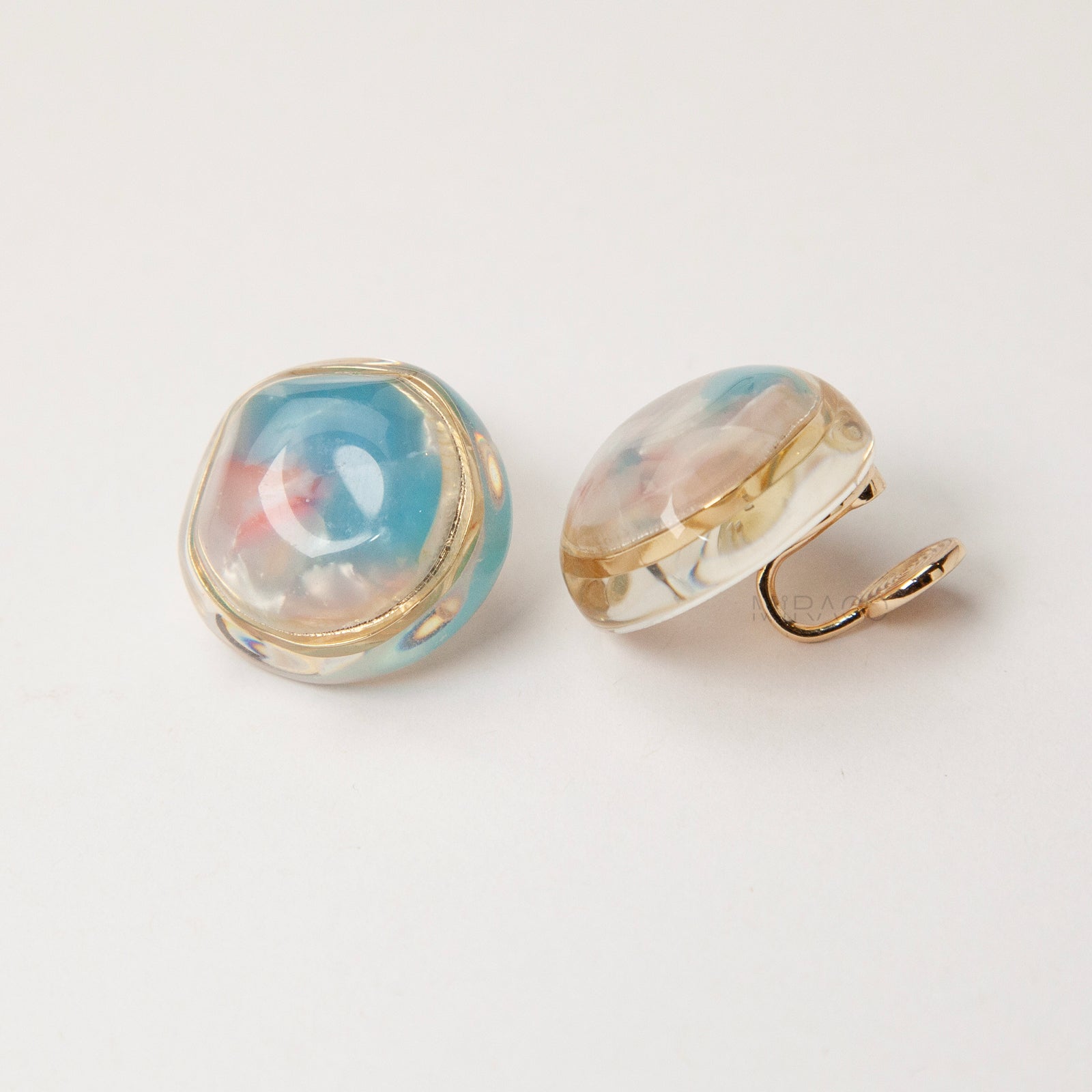 clip on earrings coil back, vintage style clip on earrings, dome resin earrings, blue pink clip on earrings, non pierced earrings gold trim, retro clip on earrings, resin dome jewellery, coil back earrings for women, lightweight clip on earrings