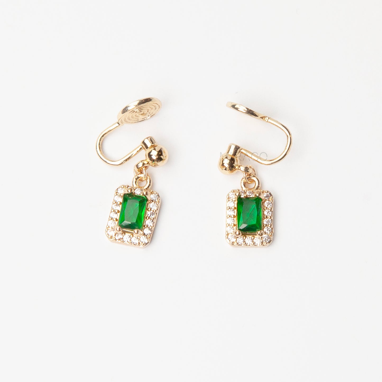 emerald green clip on earrings, rectangle drop earrings, crystal border clip on earrings, gold clip on earrings, non pierced earrings green stone, elegant clip on earrings, green drop earrings, coil back clip on earrings, statement clip on earrings