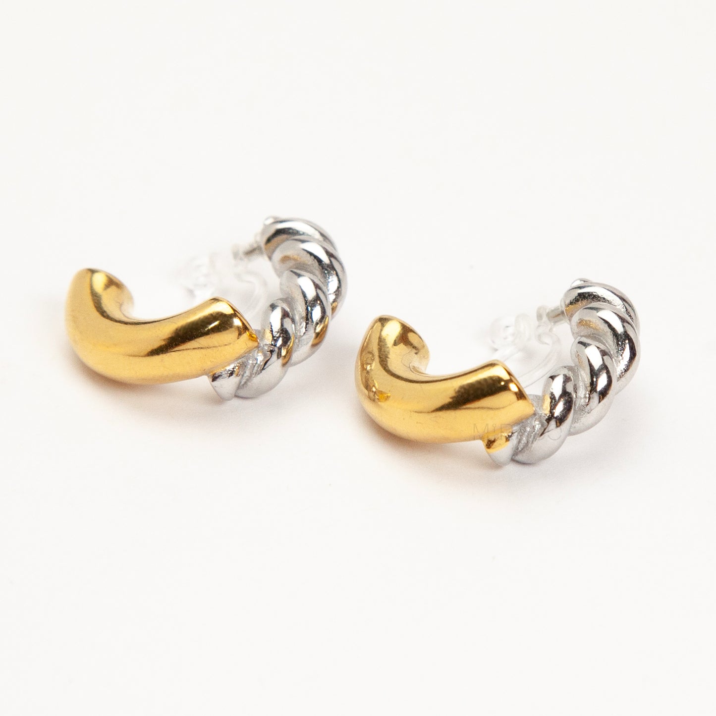 two tone twist invisible clip on hoop earrings stainless steel gold and silver non pierced