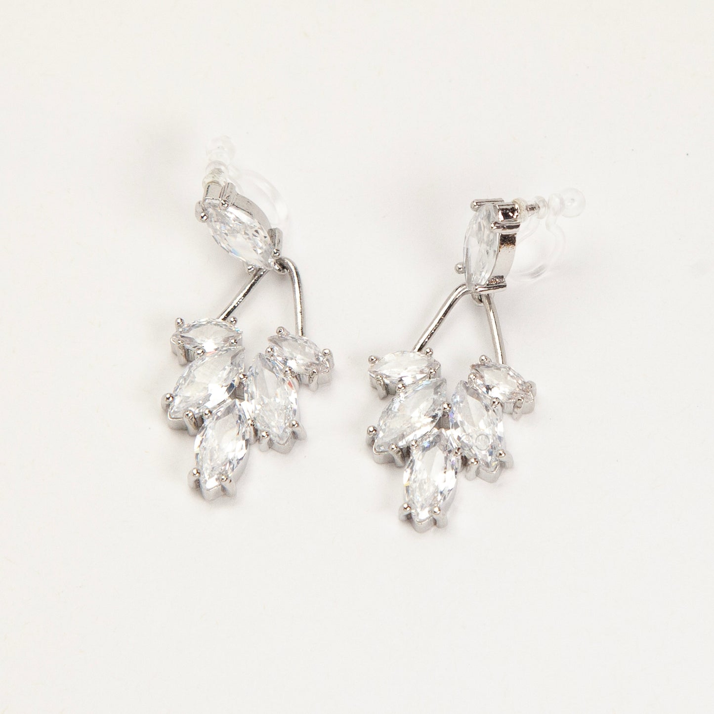 diamond drop invisible clip on earrings gold and silver brass clear resin non pierced leaf design