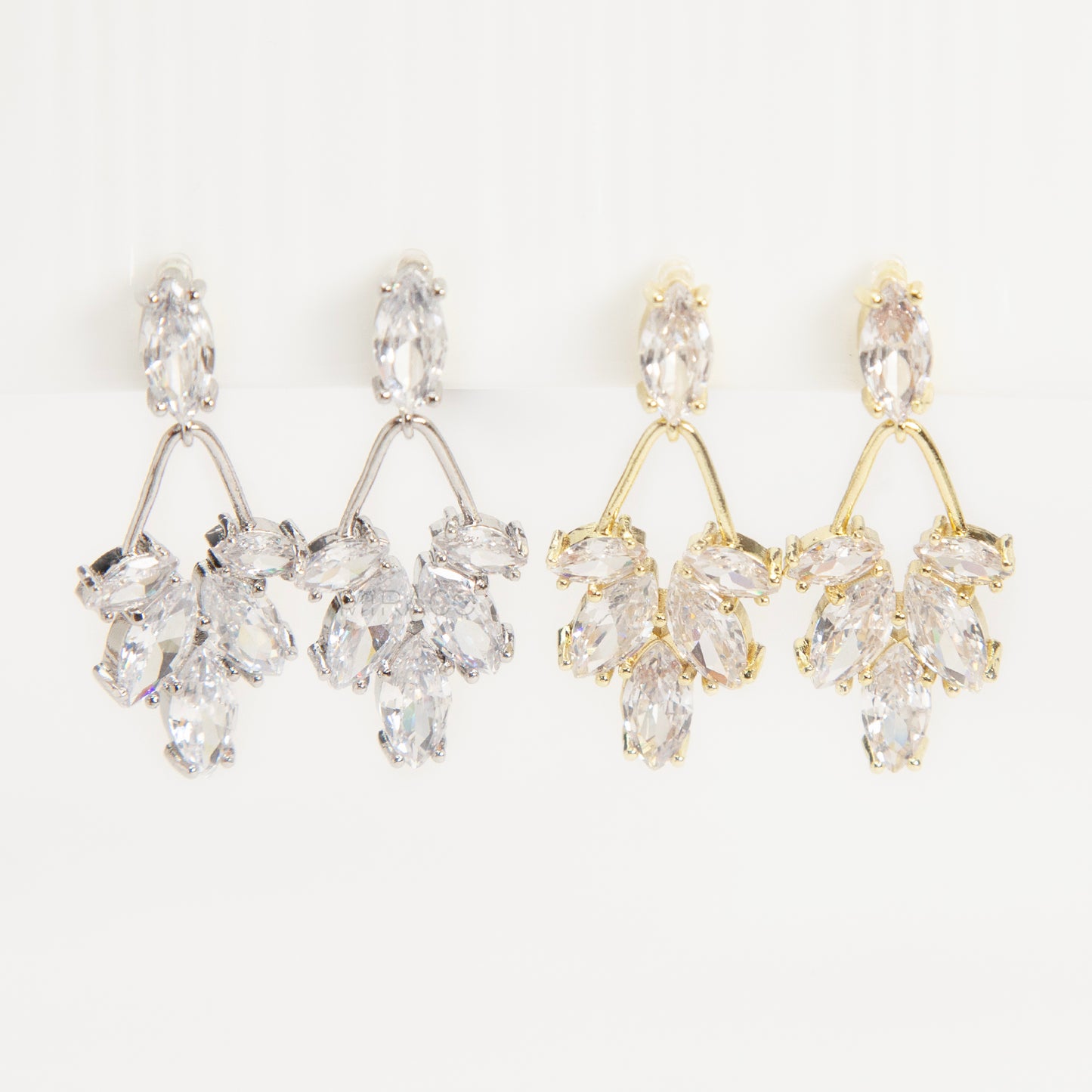 diamond drop invisible clip on earrings gold and silver brass clear resin non pierced leaf design