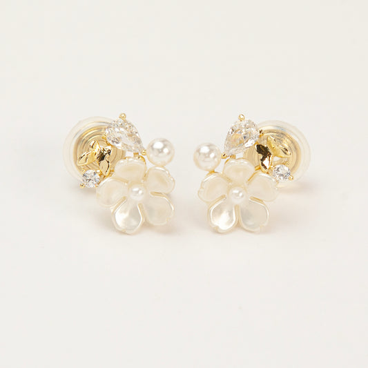 Gold-tone pearl flower clip-on earrings with crystals and coil-back clips for non-pierced ears.