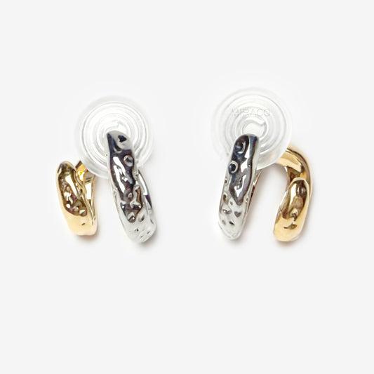 Two-tone double hoop clip-on earrings with textured silver and gold hoops, coil-back design