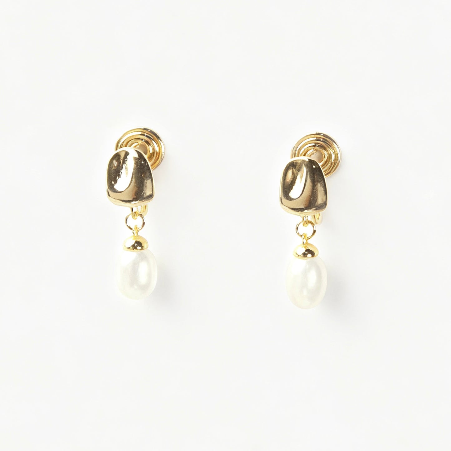 Pair of Gold-Tone Dangle Freshwater Pearl Clip-On Earrings with Coil Back closure.
