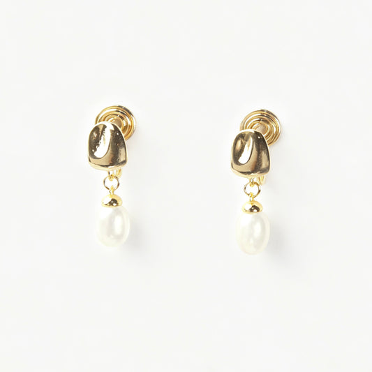 Pair of Gold-Tone Dangle Freshwater Pearl Clip-On Earrings with Coil Back closure.