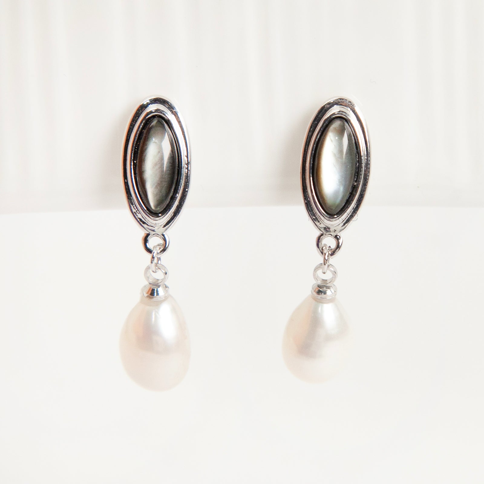 Silver oval pearl drop clip-on earrings for non-pierced ears