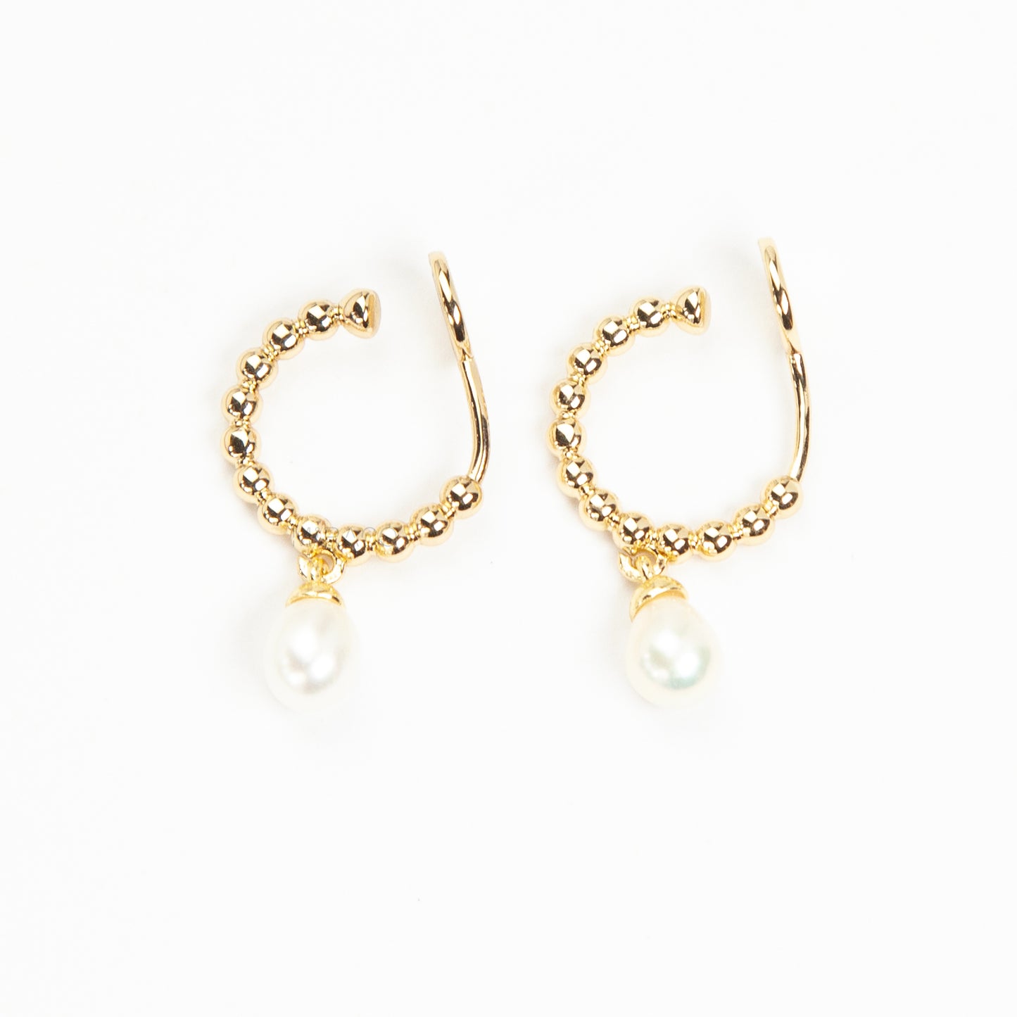 gold beaded hoop clip-on earring with a dangling pearl