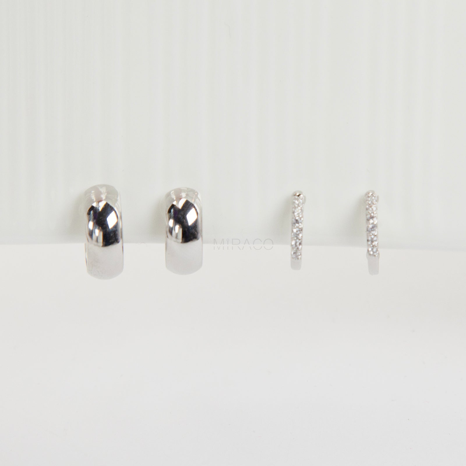 Silver minimalist clip-on hoop earrings set with two simple hoop styles for non-pierced ears.