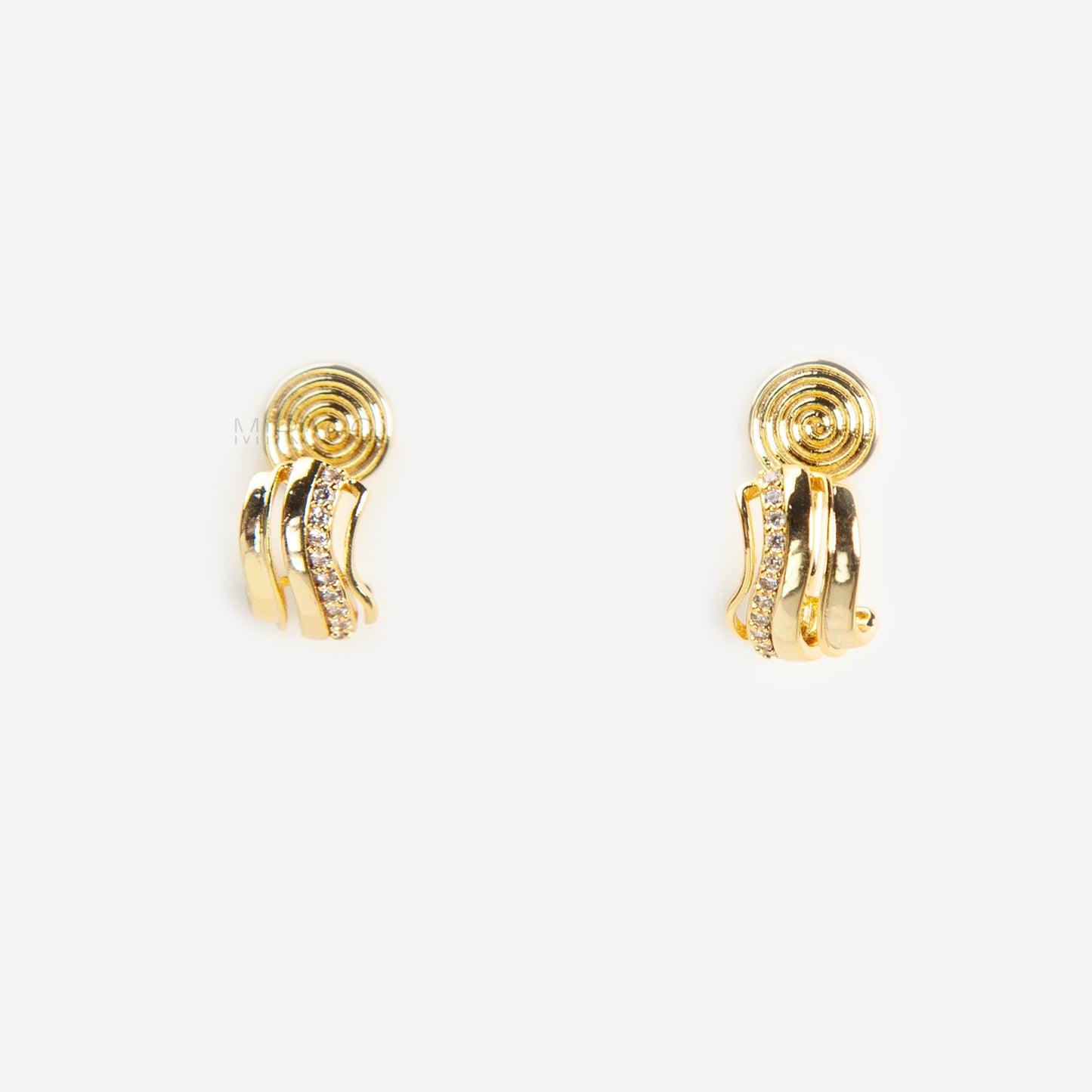 Close-up of gold-tone clip-on earrings featuring a modern stacked band design with a row of small clear crystals and a spiral coil-back.