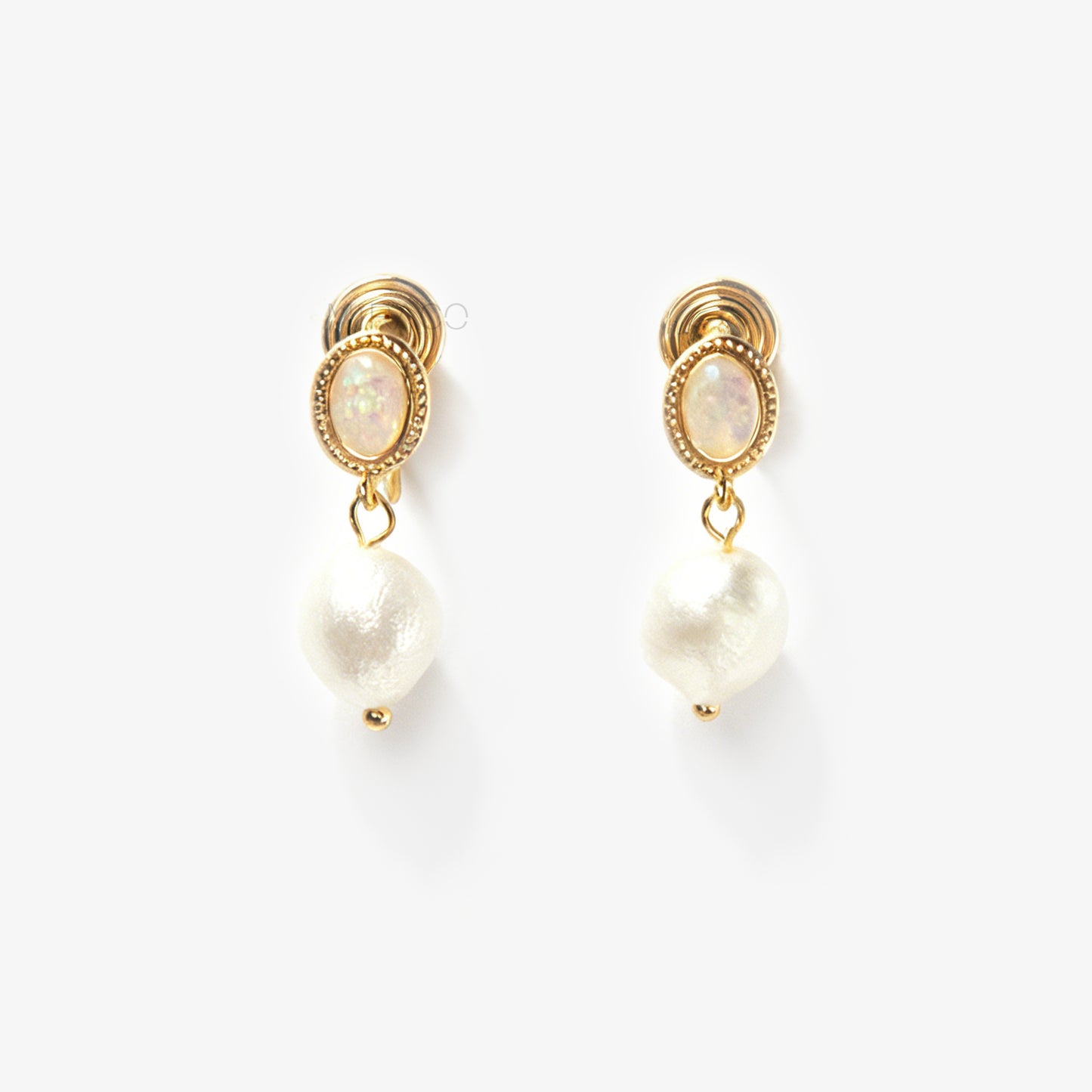 Pair of gold-tone, coil-back clip-on earrings with an oval, bezel-set iridescent opal-effect stone and a dangling real, irregularly shaped baroque freshwater pearl.