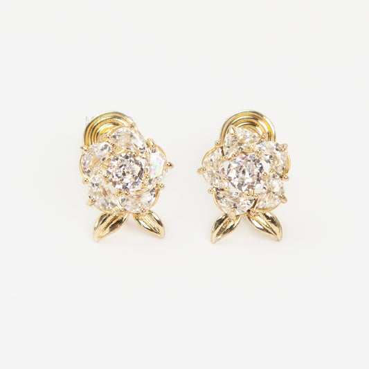 Pair of elegant gold-tone clip-on stud earrings shaped like a fully bloomed rose flower, set with a cluster of round and marquise-cut cubic zirconia stones, with a coil back clasp.