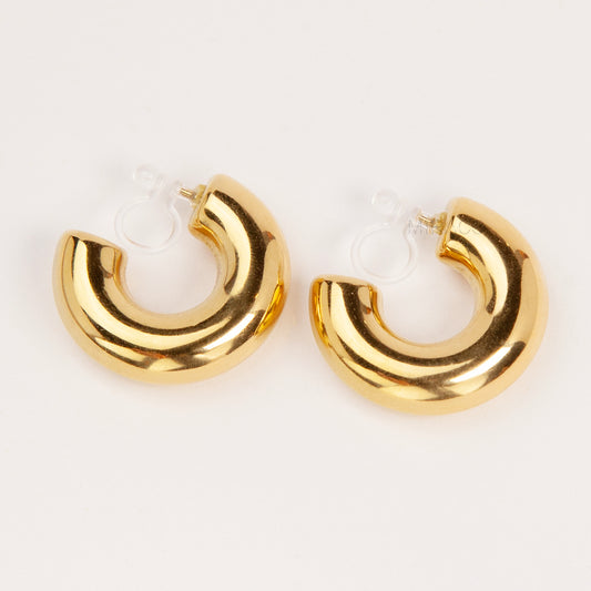 Gold chunky hoop clip-on earrings with polished finish and clear comfort clip for non-pierced ears