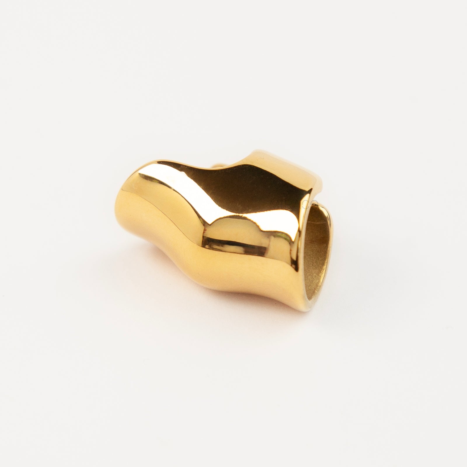 A solid, wide, dome-style chunky gold ear cuff crafted from high-polish stainless steel