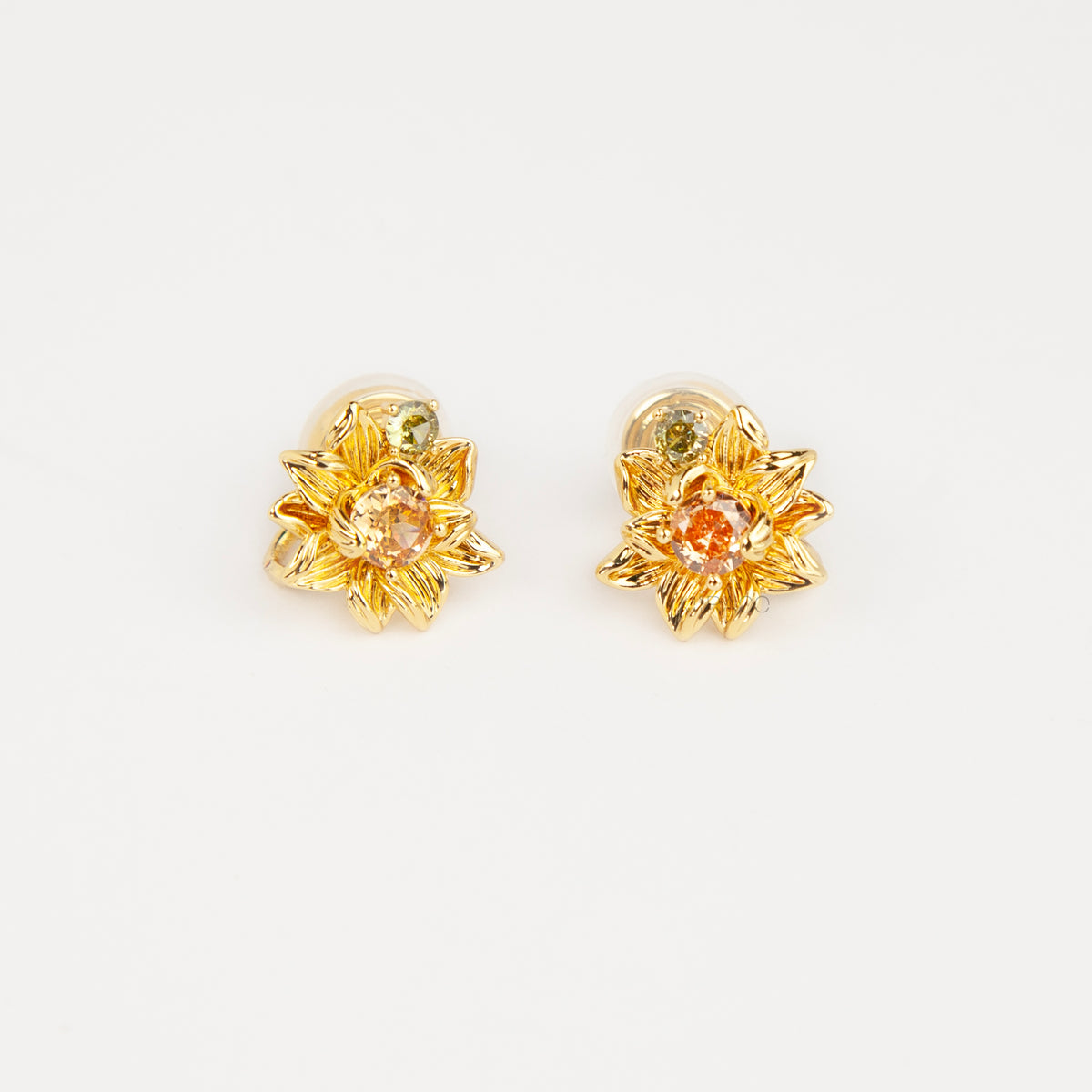 Pair of detailed gold sunflower clip-on stud earrings with amber crystal centers and olive green stone accents