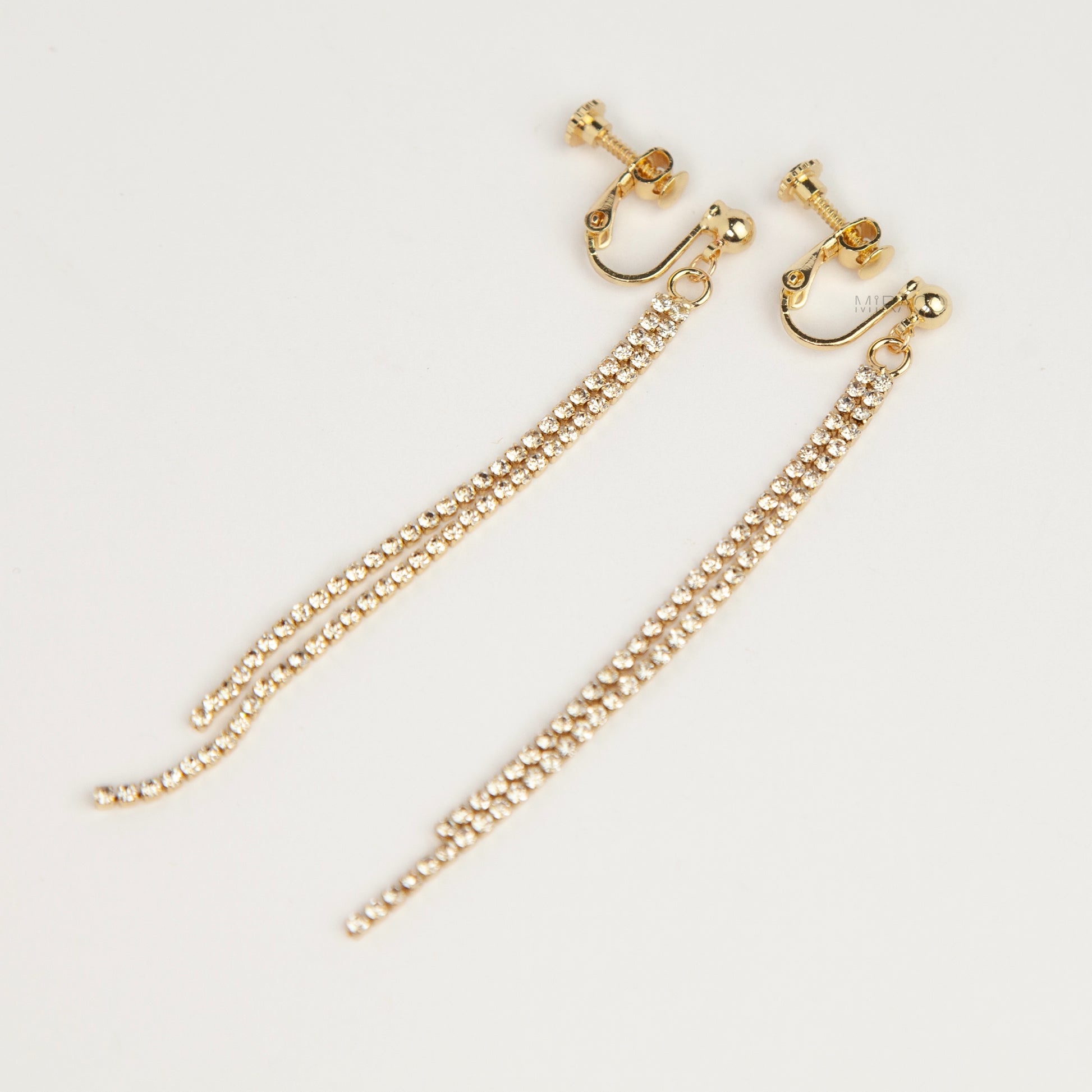 Gold and silver long crystal fringe tassel clip-on earrings with adjustable screw back and mini clip options 