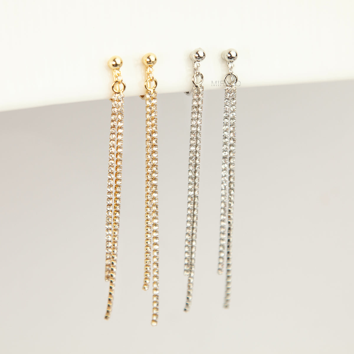 Gold and silver long crystal fringe tassel clip-on earrings with adjustable screw back and mini clip options 