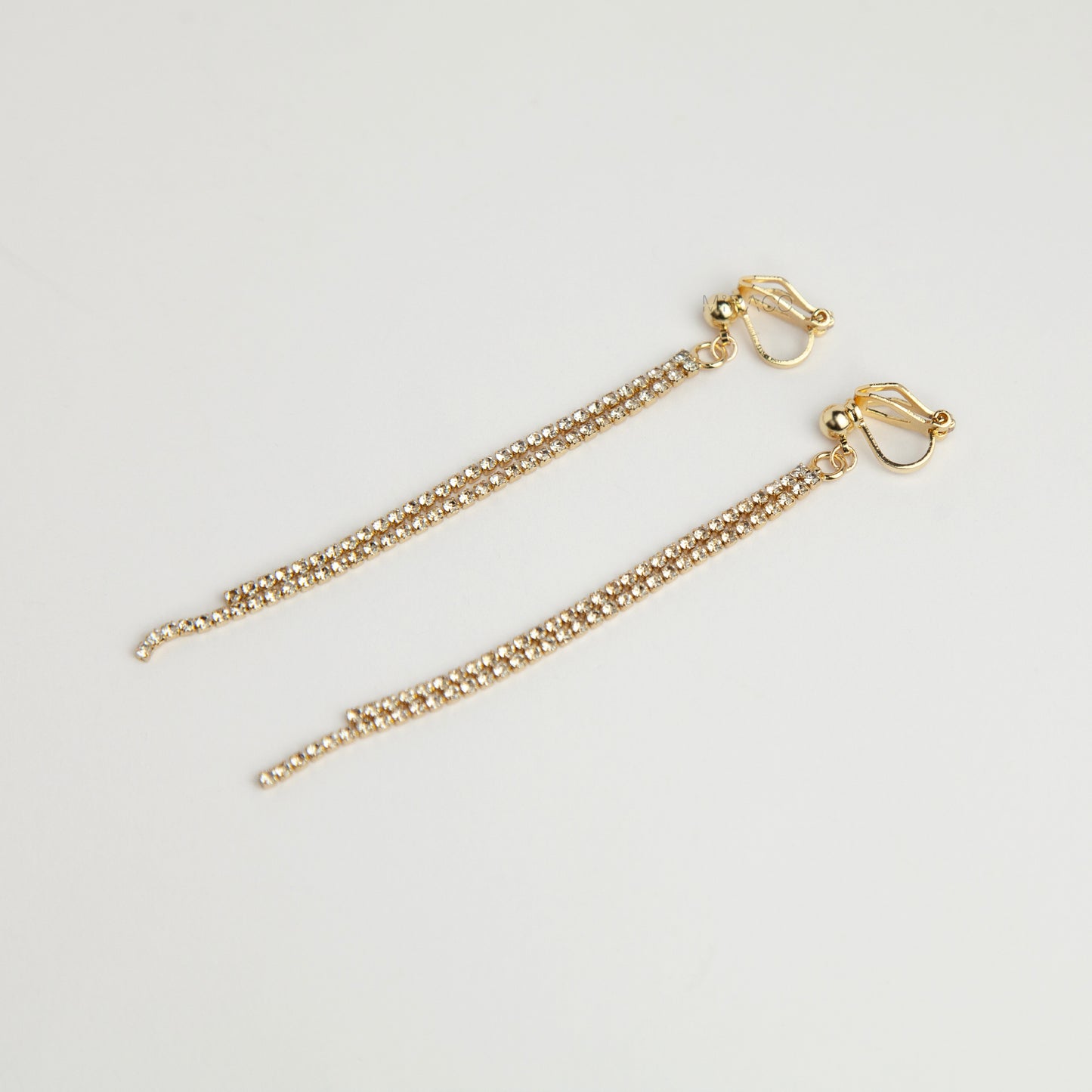 Gold and silver long crystal fringe tassel clip-on earrings with adjustable screw back and mini clip options 