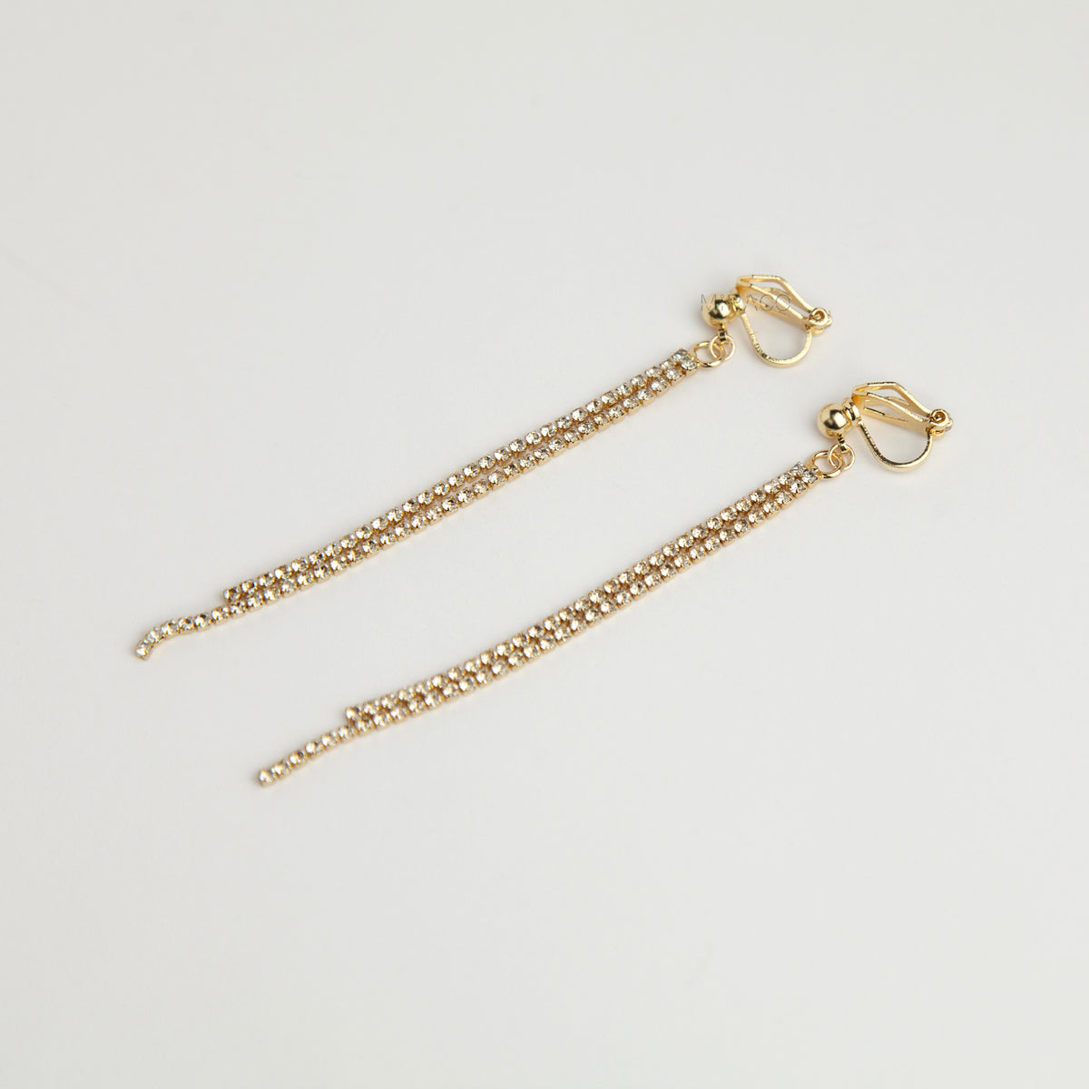 Gold and silver long crystal fringe tassel clip-on earrings with adjustable screw back and mini clip options 