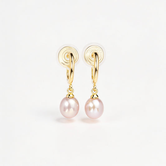 gold clip-on hoop earrings with a teardrop purple freshwater pearl dangle and coil back for non-pierced ears.