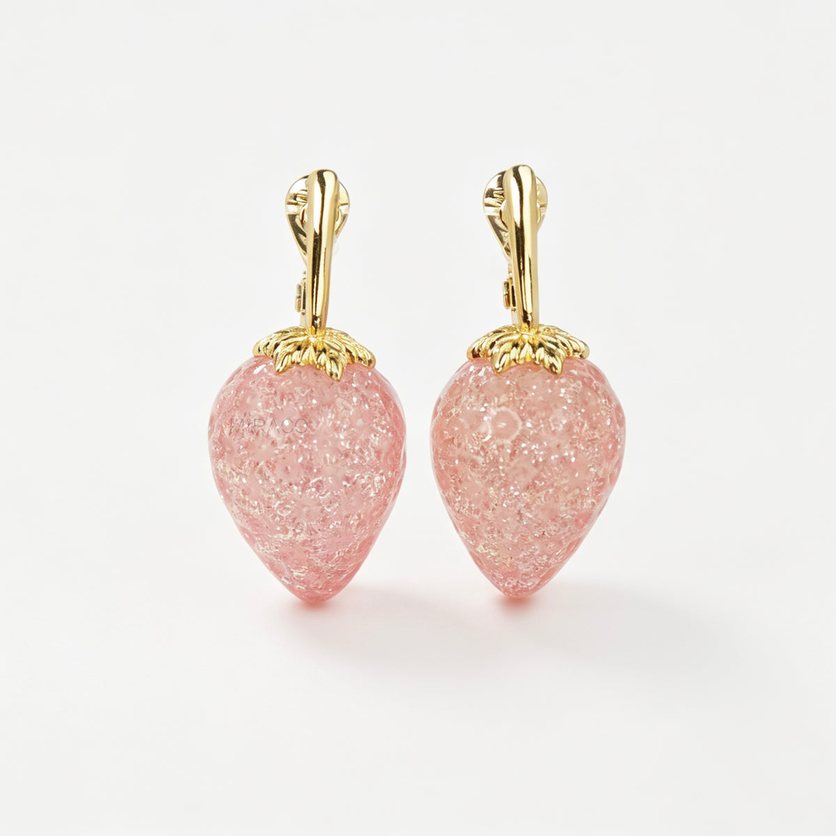 sparkling pink resin strawberry clip-on drop earring with a gold foldable paddle back for non-pierced ears.