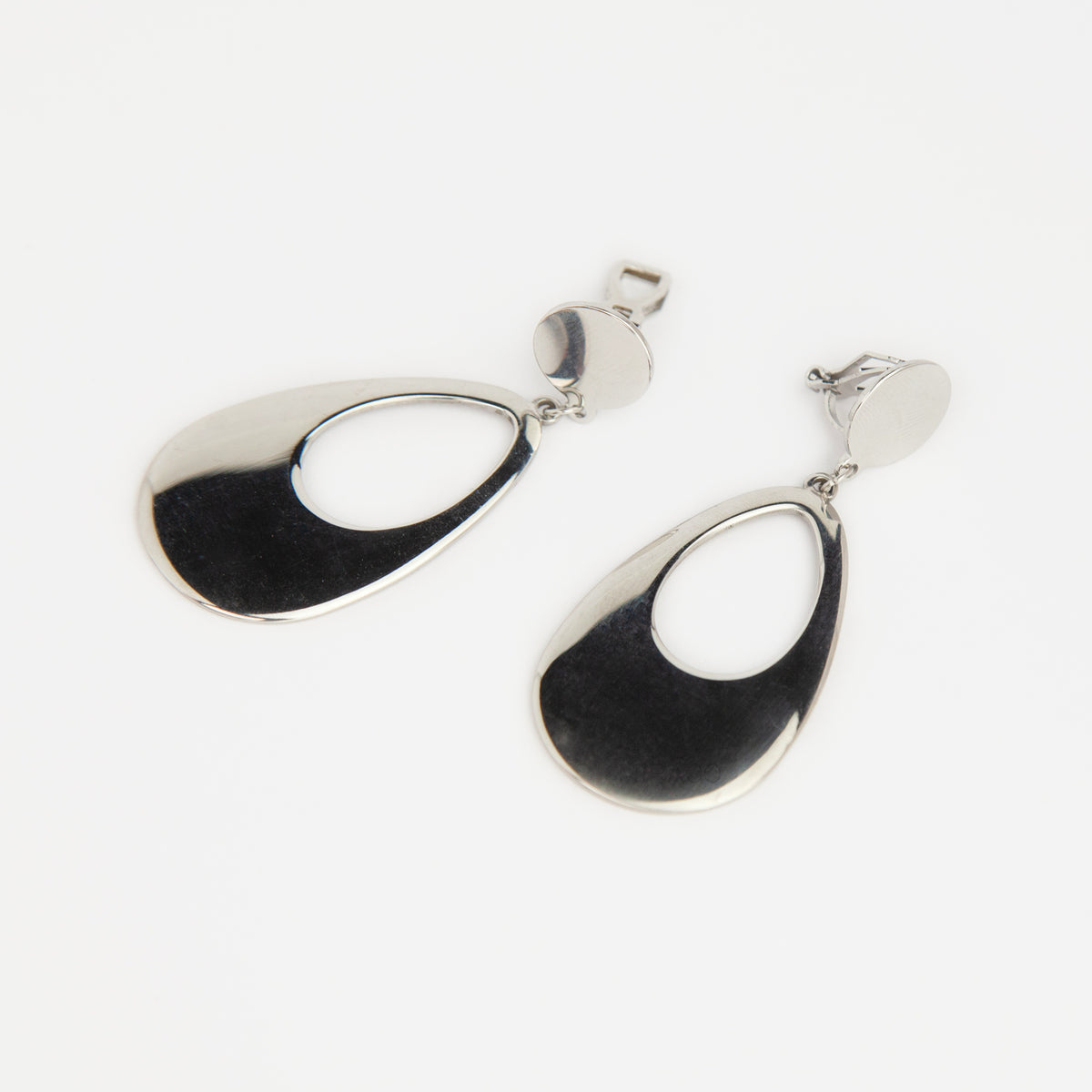 bold gold-plated stainless steel hollow teardrop clip-on dangle earrings with discreet mini-clip backs for non-pierced ears.