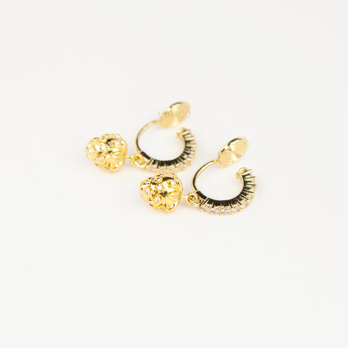 gold-plated strawberry clip-on hoop earrings with pavé cubic zirconia and a comfortable coil back for non-pierced ears.