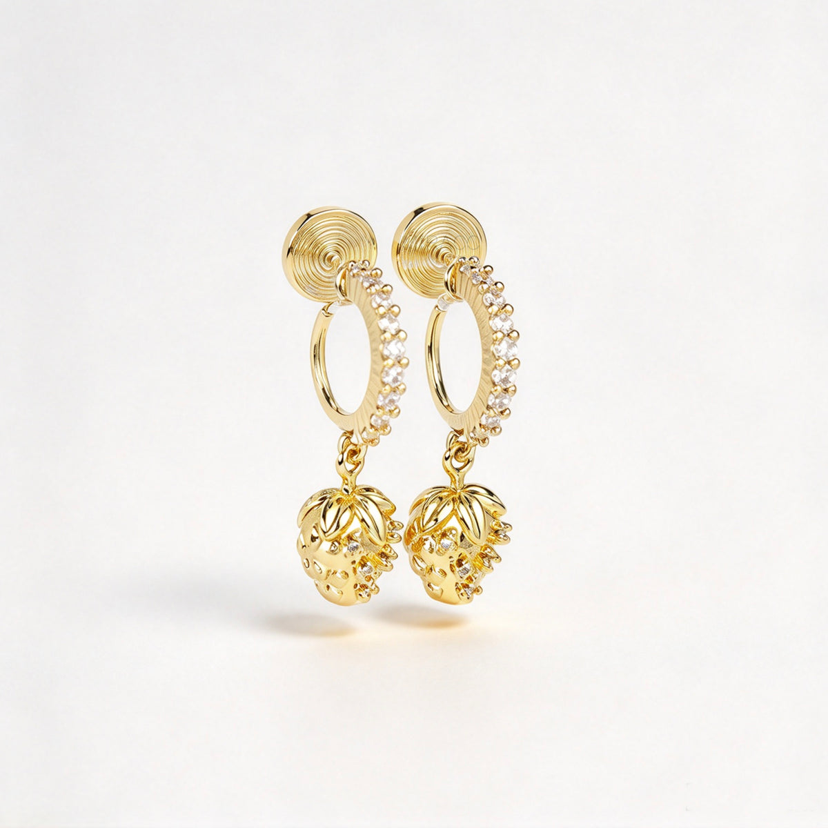 gold-plated strawberry clip-on hoop earrings with pavé cubic zirconia and a comfortable coil back for non-pierced ears.