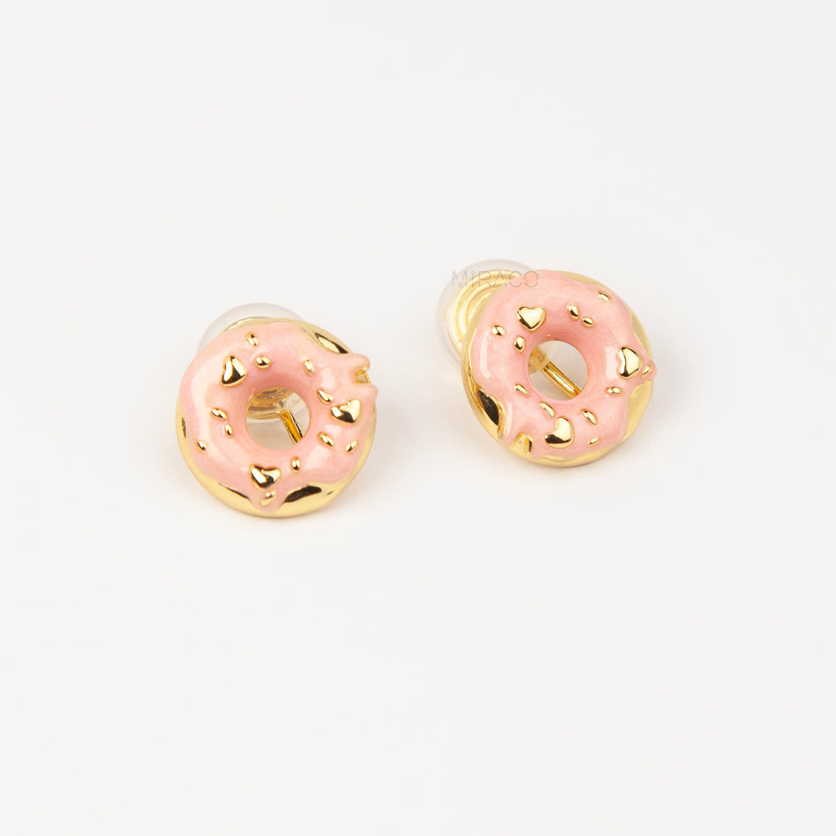 pink enamel donut clip-on earrings with gold sprinkles and coil back non-pierced closure