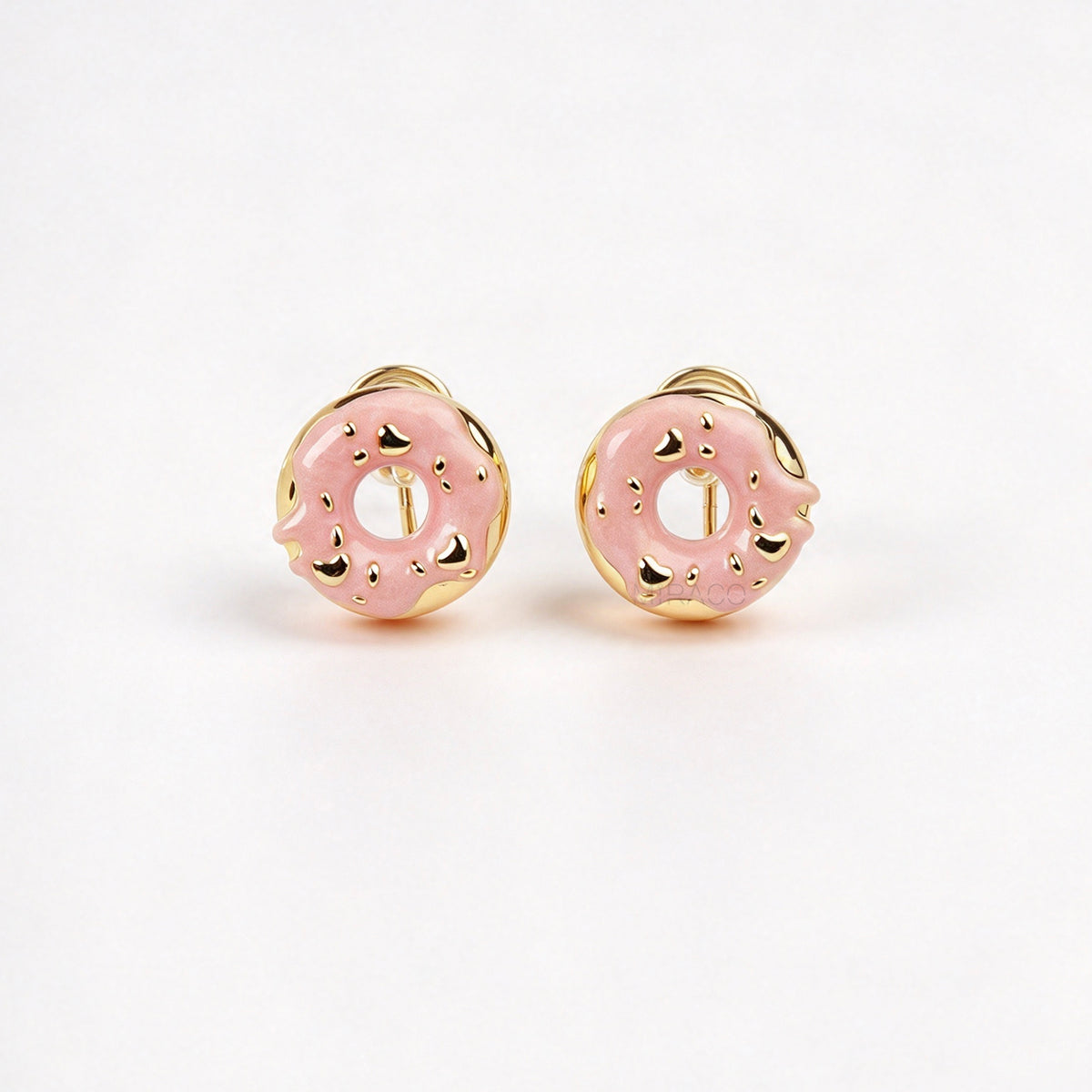 pink enamel donut clip-on earrings with gold sprinkles and coil back non-pierced closure