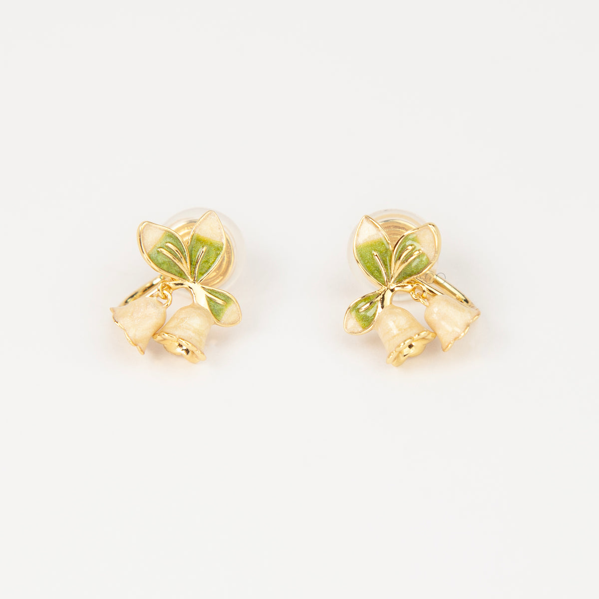 Lily of the Valley floral coil back clip-on earrings with green enamel leaves and pearlescent white flower drops
