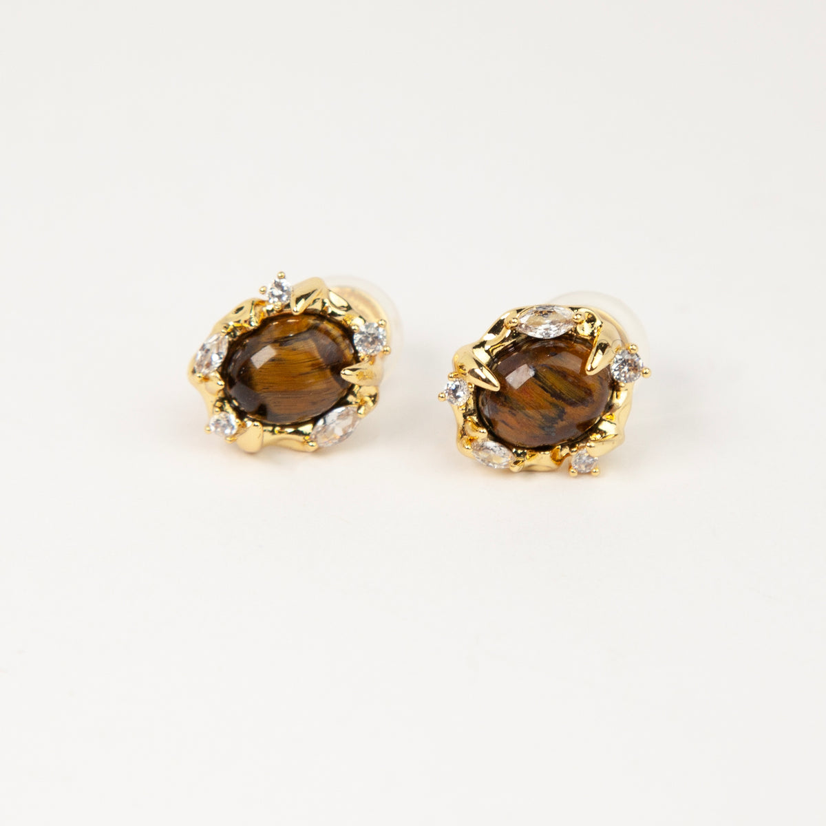 vintage oval tiger's eye cabochon clip-on earrings with cubic zirconia halo accents and coil back non-pierced closure