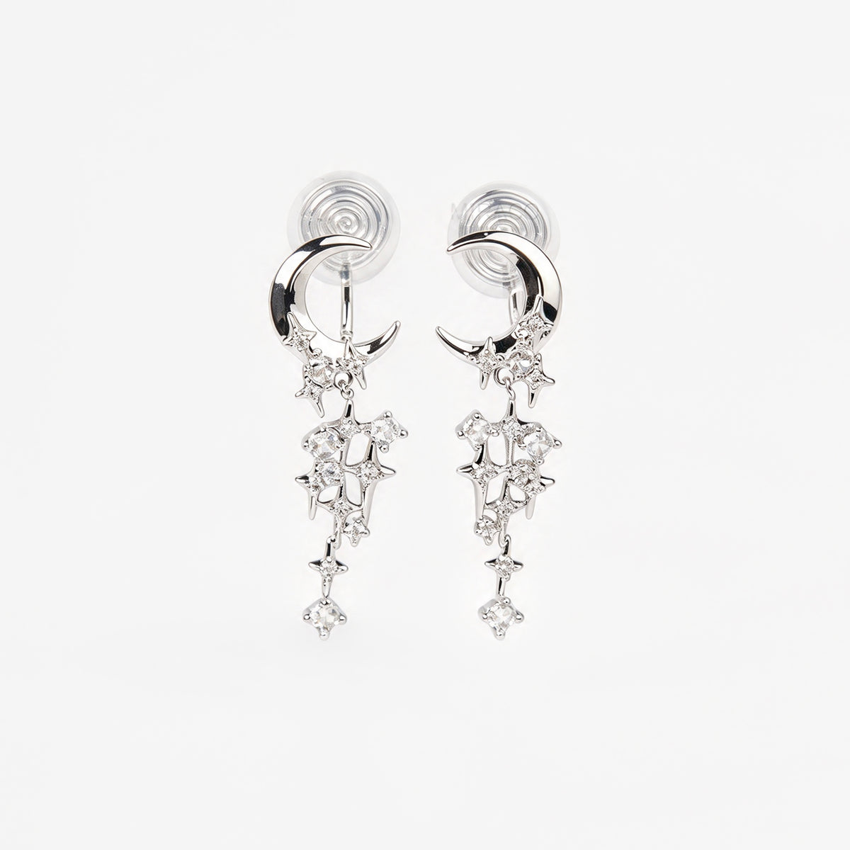 silver celestial crescent moon and starburst dangle clip-on earrings set with cubic zirconia and coil back non-pierced closure