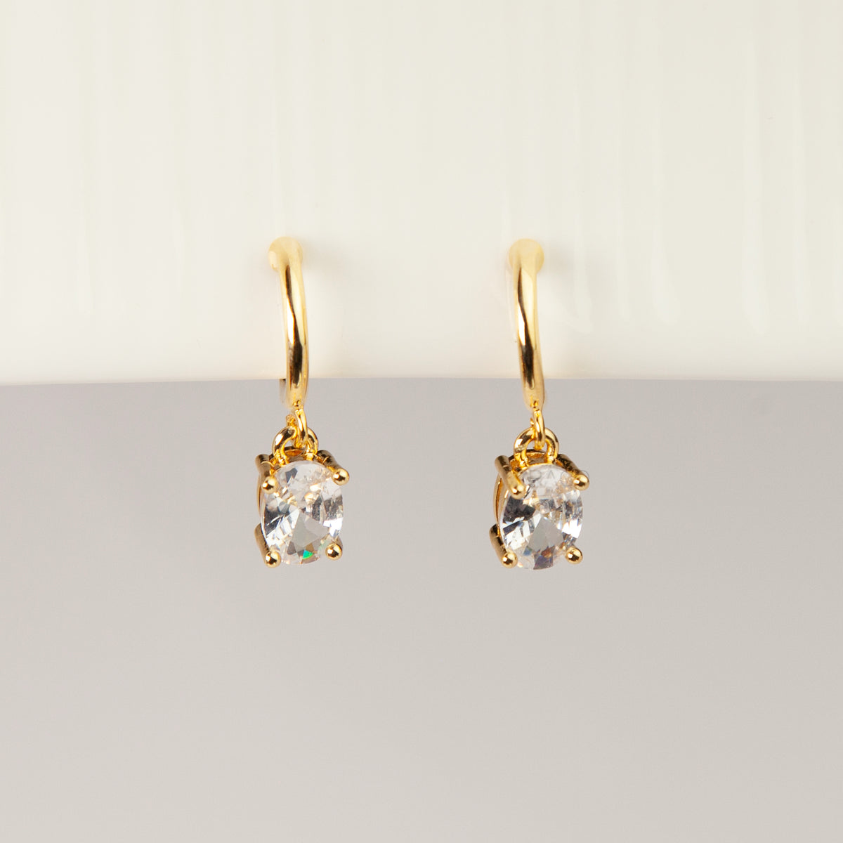 18K gold plated oval solitaire crystal huggie drop clip-on earrings with coil back non-pierced closure