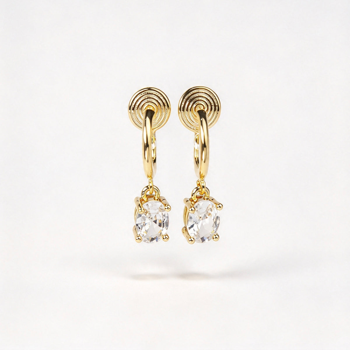 8K gold plated oval solitaire crystal huggie drop clip-on earrings with coil back non-pierced closure