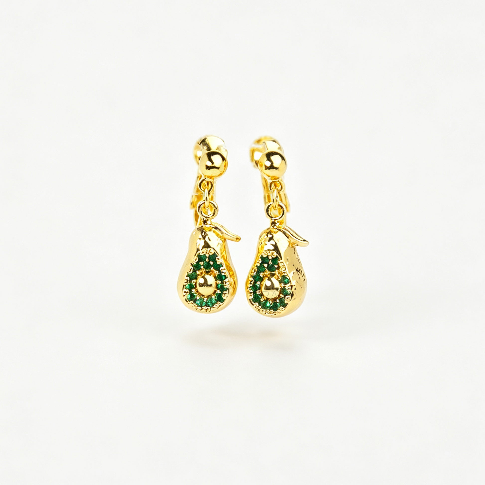 Pair of gold-toned non-pierced avocado clip-on drop earrings with green crystal accents and adjustable screw-back mechanisms.