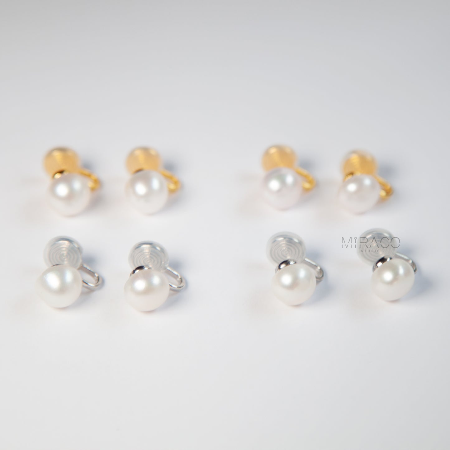 imeless Elegance with All-Day Comfort – No Piercing Needed.

These classic clip-on pearl stud earrings feature a single, lustrous white freshwater pearl (approx. 10–11mm), set on a minimalist silver or gold-tone flat coil clip. Understated and effortlessly chic, they're perfect for both everyday style and special occasions.

Designed for comfort, the flat coil back offers a secure hold while remaining gentle on non-pierced ears.