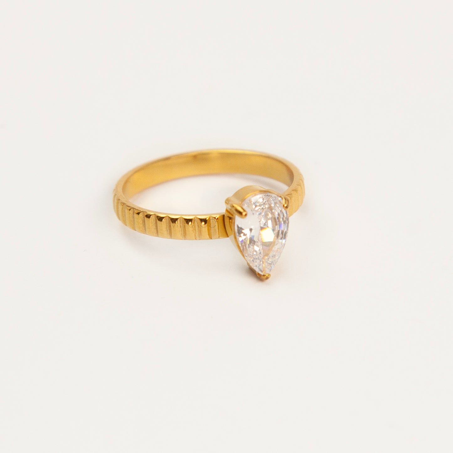 Gold Ribbed Pear-Cut Solitaire Ring – Waterproof Stainless Steel Jewelry